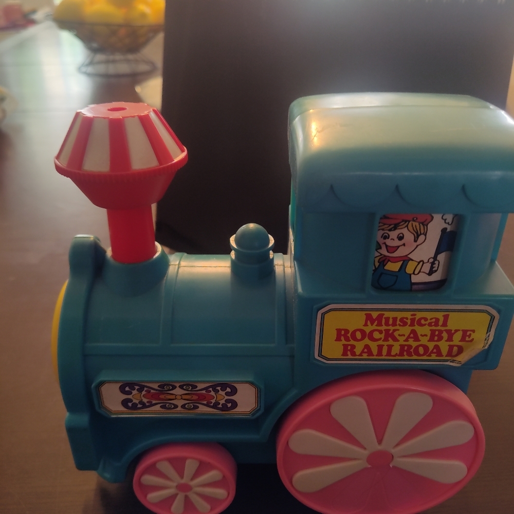 Fisher price musical rock‎ a bye railway